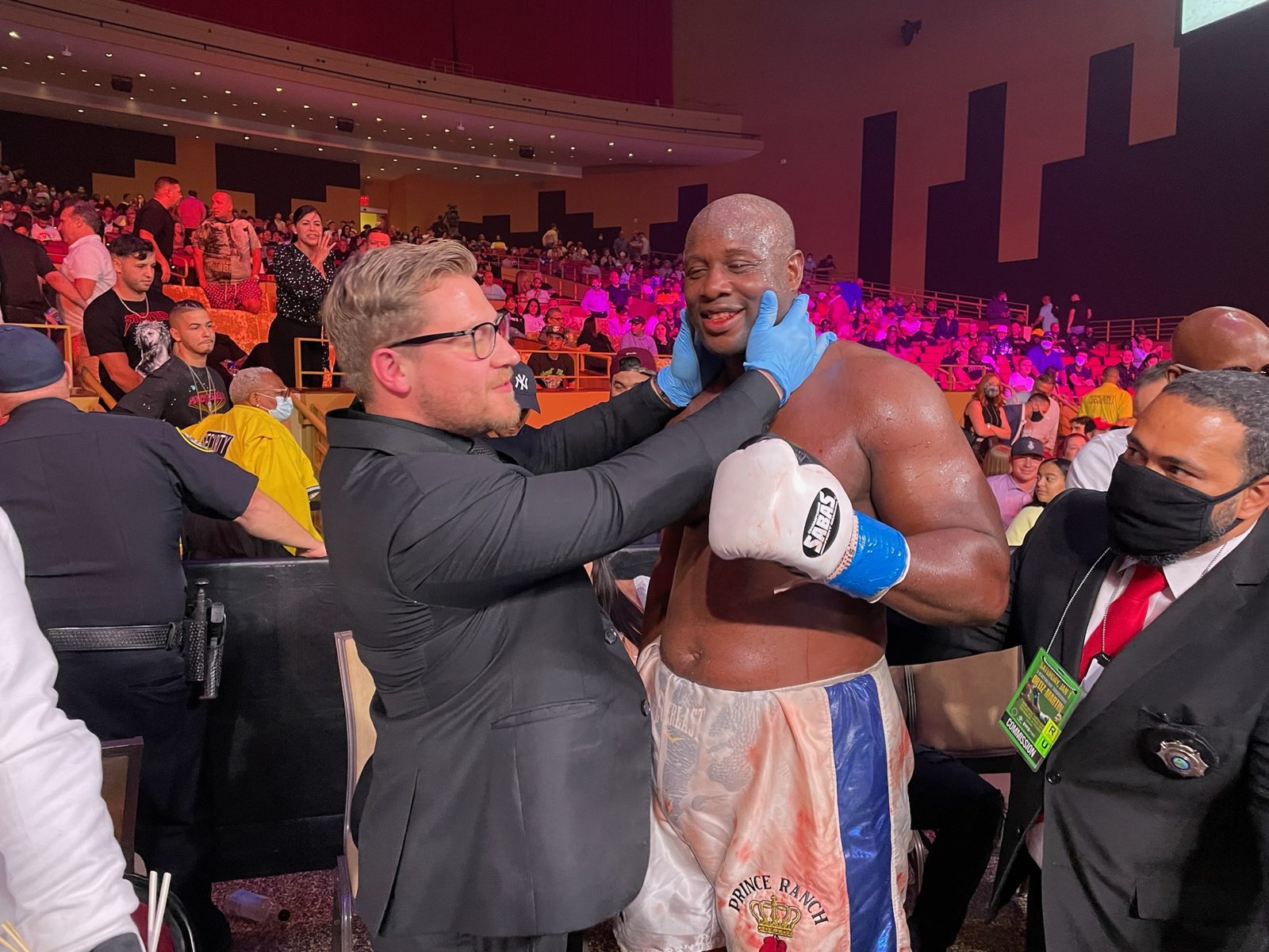 Dr. Pecherek examining a boxer ringside